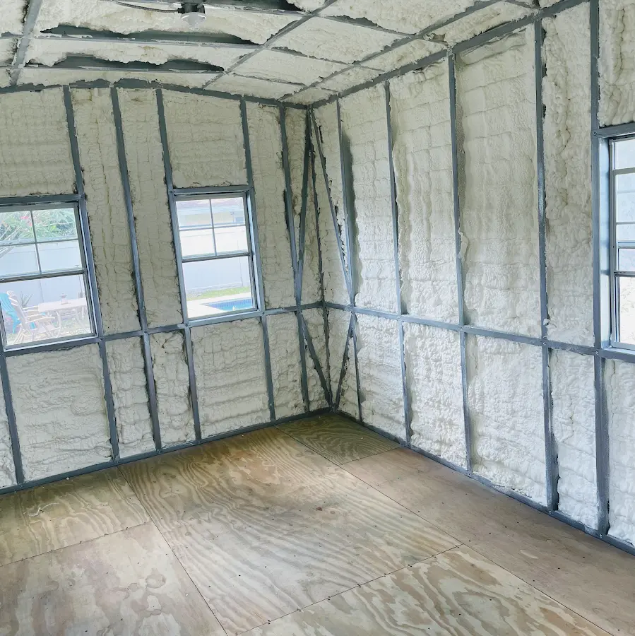 Closed-cell spray foam insulation applied to wall cavities in a residential project in Orono